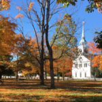 Historic Amherst Village Green in New Hampshire surrounded by autumn foliage