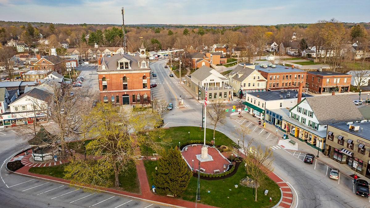 Historic Milford Oval in Southern New Hampshire, featuring the town center, green space, and surrounding downtown buildings.